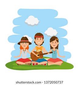 hippies playing guitar in the field