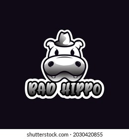 hippo wearing a hat with a funny face logo design