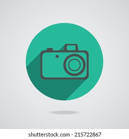 Hipster black photo camera icon element for web design. Flat icon with long shadow. Logo concept. Vector illustration on teal background. EPS10