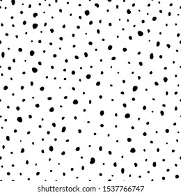 Hipster black and white seamless polka dot pattern. Vector irregular abstract texture with random hand drawn spots.