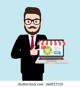 Hipster Businessman holding laptop and pointing at online store on the screen 