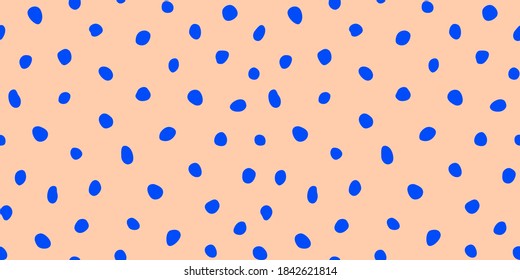 Hipster colorful seamless polka dot pattern. Vector irregular abstract texture with random hand drawn spots.