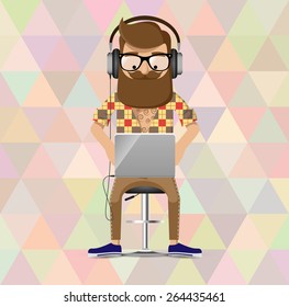 hipster in headphones is seating on the bar chair and working with laptop