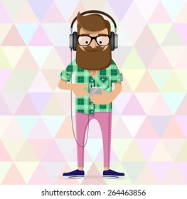 hipster with headphones is selecting song on modern phone