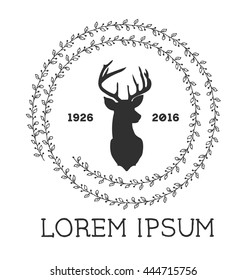 Hipster logo with silhouette of deer and twigs around. Hand drawn brush. Vector illustration. Reindeer logotype for hunting club or touristic camp.