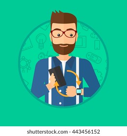 Hipster man with the beard holding a smartphone and looking at his smart watch. Synchronization between smartwatch and smartphone. Vector flat design illustration in the circle isolated on background.