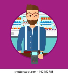 A hipster man paying wireless with his smart watch at the supermarket. Male customer making payment for purchase with smart watch. Vector flat design illustration in the circle isolated on background.