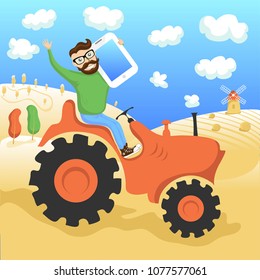 The hipster on the tractor with a tablet