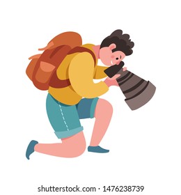 Hipster photographer holding photo camera. Flat vector cute male cartoon character, blogger, reporter or tourist taking picture. Creative profession and occupation