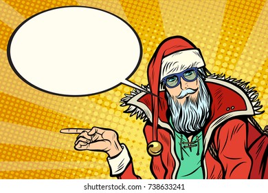 Hipster Santa Claus shows sideways and says comic cloud. Christmas holiday and New year. Pop art retro vector illustration
