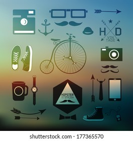 Hipster style elements, icons and labels on blur background can be used for  retro vintage  website