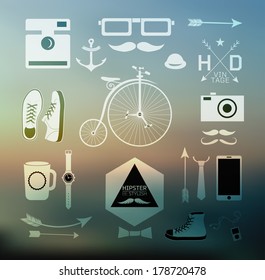 Hipster style elements, icons and labels on blur background can be used for  retro vintage  website