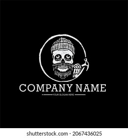 Hipster style logo design; artwork consisting of a skull wearing a hat and holding a hammer