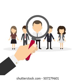 Hiring staff concept. Hand with magnifying glass finding and recruiting new worker.