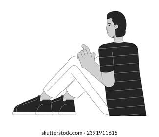 Hombre hispano sentado en el suelo, personaje de caricatura en 2D en blanco y negro. Joven latinoamericano aislado de la persona de contorno vectorial. Apuntar con la mano, sonriendo con atención monocromática ilustración de punto plano