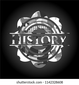 History written on a grey camouflage texture