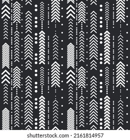 flechas blancas sobre un fondo negro. Las flechas de decoración vectorial se repiten a lo largo del patrón.