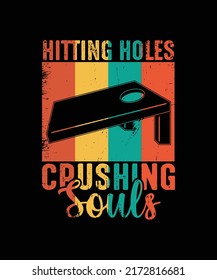 HITTING HOLES AND CRUSHING SOULS. Cornhole vintage t-shirt design.