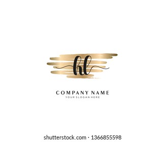 HL initial handwriting logo with brush gold color template vector