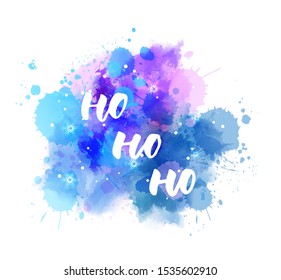 Ho ho ho -  decorative Christmas holiday handwritten calligraphy handlettering. On watercolor blue and purple paint splash blot with snowflakes. Xmas concept illustration.