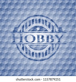 Hobby blue badge with geometric background.