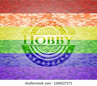 Hobby emblem on mosaic background with the colors of the LGBT flag