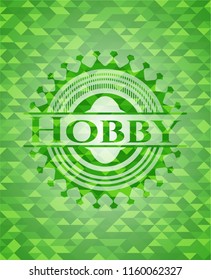 Hobby green emblem with triangle mosaic background