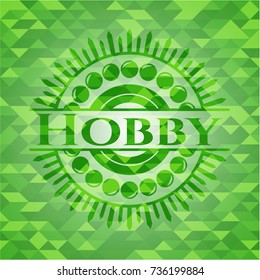 Hobby green emblem with triangle mosaic background