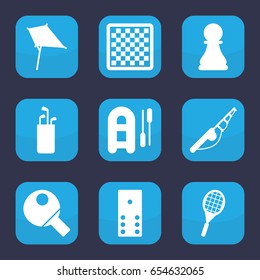 Hobby icon. set of 9 filled hobby icons such as kite, tennis rocket, chess pawn, table tennis, domino, chess board, fishing rod, inflatable boat