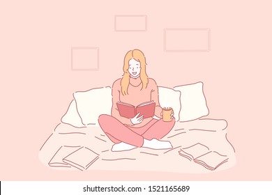 Hobby, leisure, comfort concept. Young happy woman or girl in a good mood reading a book in the coziness of drinking tea, coffee. Sweet lady is getting ready for the exam, relax at bedroom. Flat