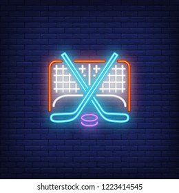 Hockey Goal, Crossed Sticks And Puck Neon Sign. Hockey Advertisement Design. Night Bright Neon Sign, Colorful Billboard, Light Banner. Vector Illustration In Neon Style.