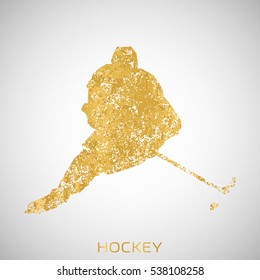 Hockey player from the gold particles. Silhouette of a hockey player consists of small abstract Golden forms. Vector image