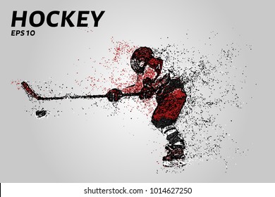 Hockey player in red uniform. Hockey from the particles