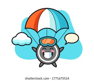 Hockey puck cartoon is skydiving with happy gesture