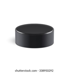 Hockey puck isolated on white with shadow