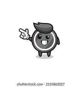 hockey puck mascot pointing top left , cute design