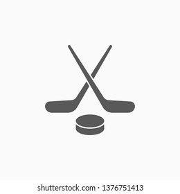 Hockey Stick And Puck Icon