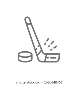Hockey stick and puck line icon.
