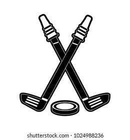 Hockey sticks and puck