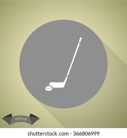 Hockey sticks and puck sport icon
