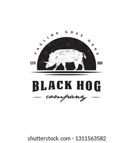 hog silhouette in black background with rustic grunge style logo icon vector template