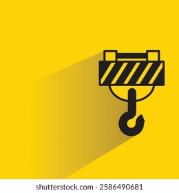 hoist crane hook icon with shadow on yellow background