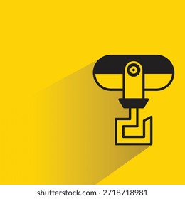 Icono del gancho de la grúa del alzamiento con la sombra en fondo amarillo