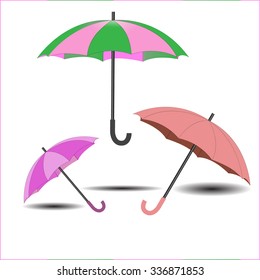 Holding multicolored umbrella isolated,Umbrellas set