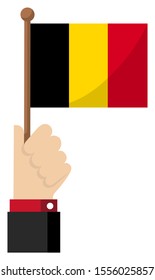 Holding the national flag in hand , flat vector illustration / Belgium