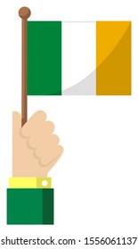 Holding the national flag in hand , flat vector illustration / Ireland