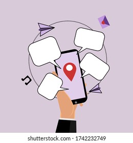 Manteniendo el teléfono para enviar un mensaje de texto sobre fondo morado. 