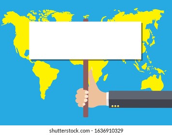 Holding a sign on a map of world