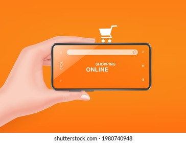 ้Hand holding a smartphone whose screen is an online shopping website. And there is a shopping cart icon on the top of the smartphone and all object on orange backgroun for online shopping concept