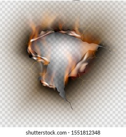 Hole torn in ripped paper with burnt and flame on transparent background